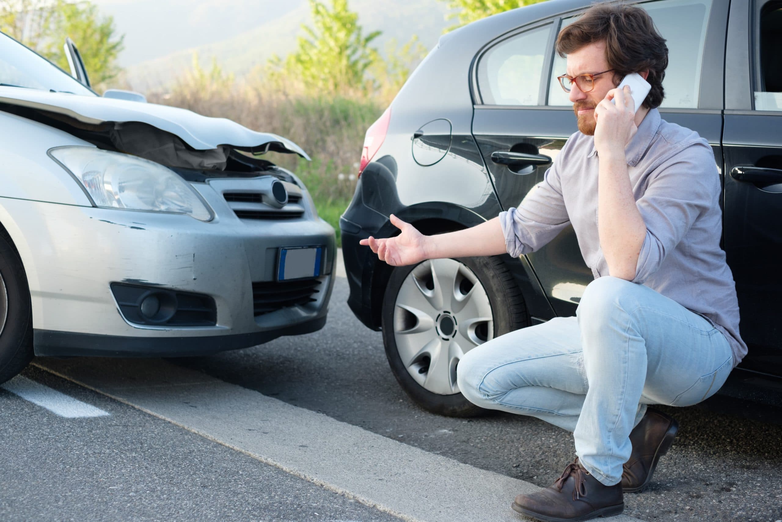 Man reporting accident to police.