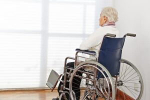 A sad patient who has suffered nursing home abuse in Colorado Springs, Colorado.