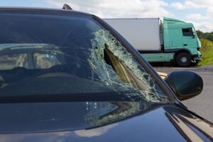 Car and truck collision on the road in Colorado Springs