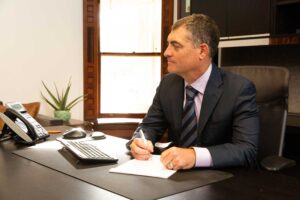 Rob Wilhite at desk