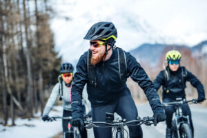 bicycle riders with helmets