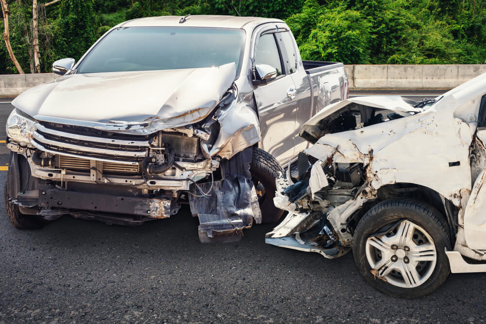 Pick-up vs sedan left turn accident along the highway.