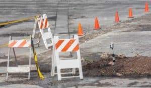Uneven surface in the grocery parking lot.